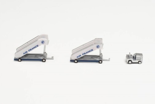 Air France historic passenger stairs(2) set of two with tow truck(1) Herpa Wings accessories 571876 scale 1:200
